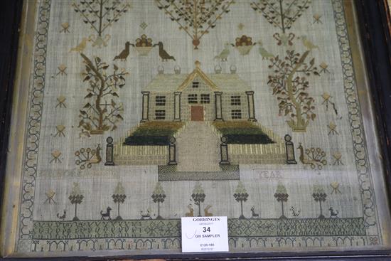 A George III needlework sampler, work with a country house, shrubs and birds, dated 1813